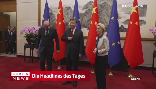 Ursula von der Leyen und Xi Jinping bei einem Treffen vor EU- und China-Flaggen.