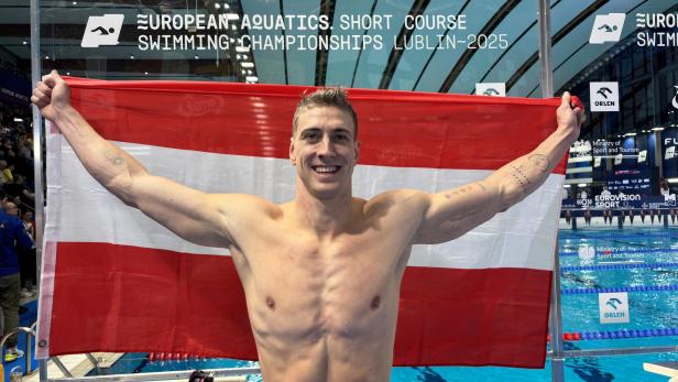 Heiko Gigler mit der österreichischen Fahne