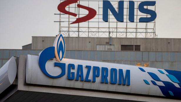 FILE PHOTO: Signages display the logos of NIS as well as Russian oil producer Gazprom Neft, in Belgrade