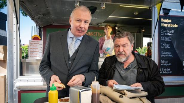 Ludger Pistor und Armin Rohde am Würstelstand