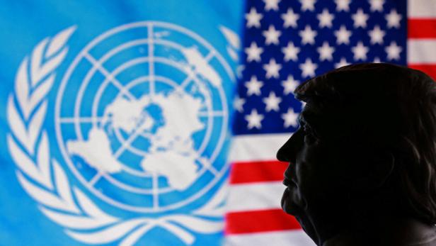 FILE PHOTO: Illustration shows 3D-printed miniature of U.S. President Donald Trump, U.S. flag and UN logo