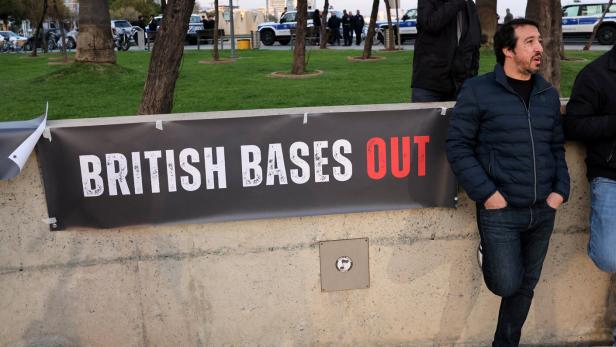 Anti-war activists in Cyprus stage a protest against U.S. and Israeli-led strikes against Iran, as well as the presence of British bases on the island, in Limassol