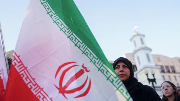 Demonstrators protest against military action in Iran after U.S. President Donald Trump said that he had agreed to a two-week ceasefire, outside the White House